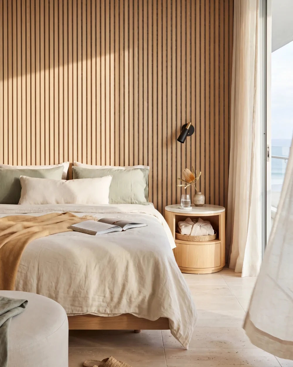Acupanel Natural Oak (Grey Felt) acoustic slat wall panels in a bedroom