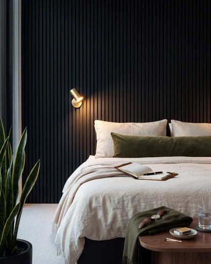 Acupanel Black acoustic slat wall panels in a bedroom