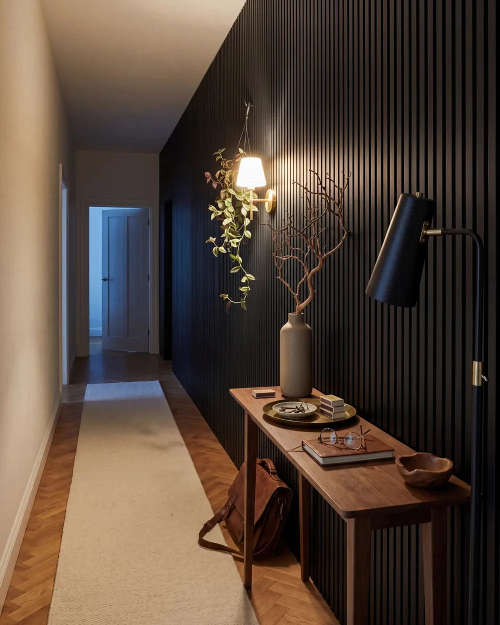 Acupanel Black acoustic slat wall panels in a hallway