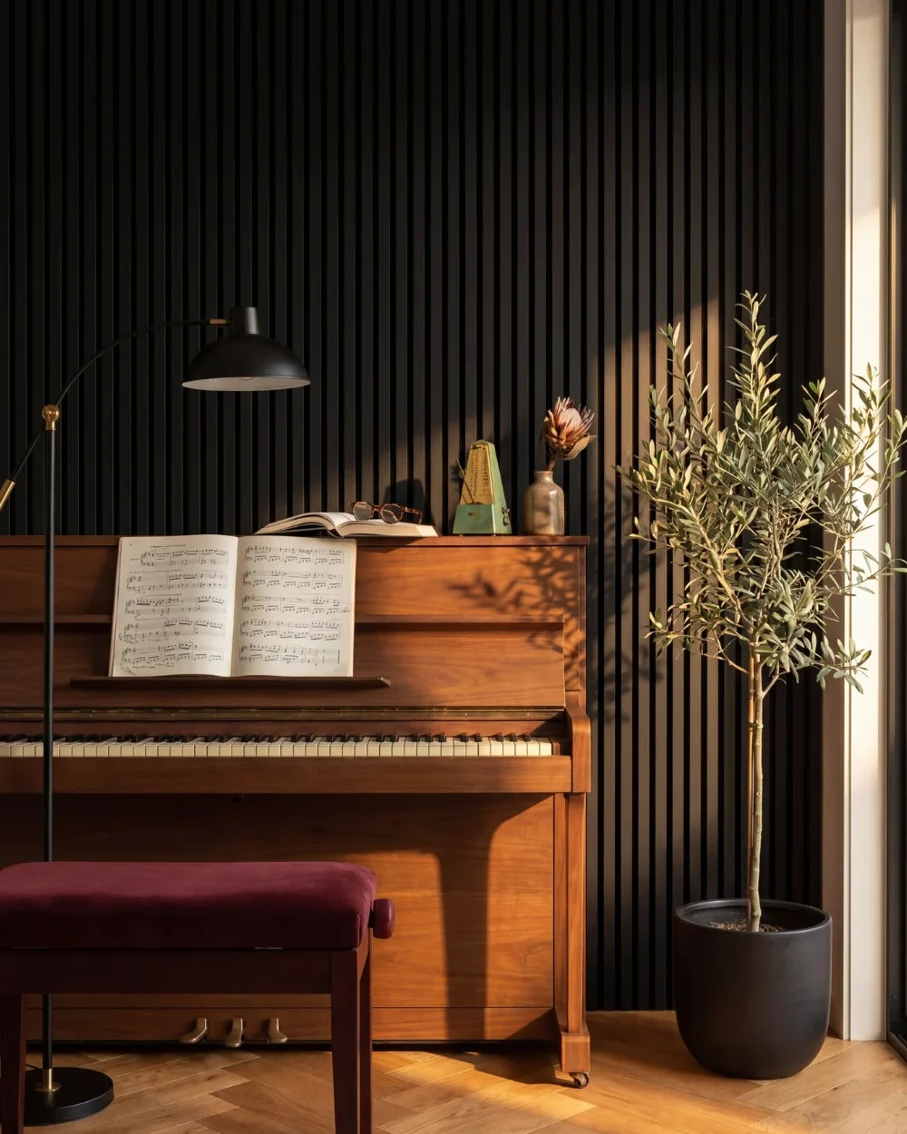 Acupanel Black acoustic slat wall panels in a music room