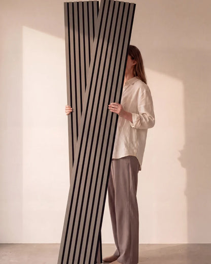 Acupanel Dusty Grey acoustic slat wall panels held in the studio
