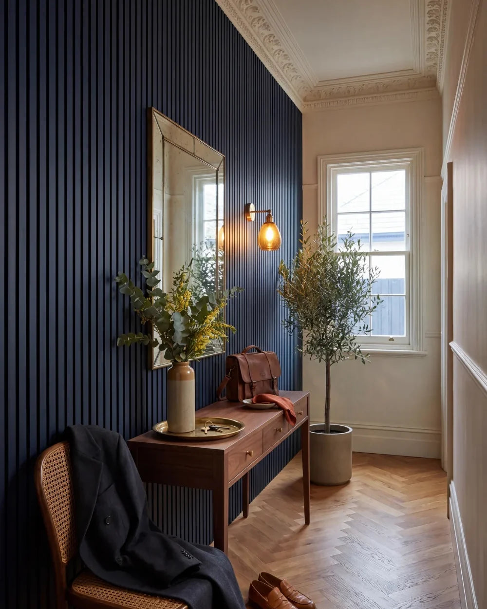 Acupanel Midnight Blue acoustic slat wall panels in a hallway