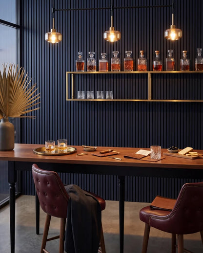 Acupanel Midnight Blue acoustic slat wall panels in a whisky bar, a commercial space