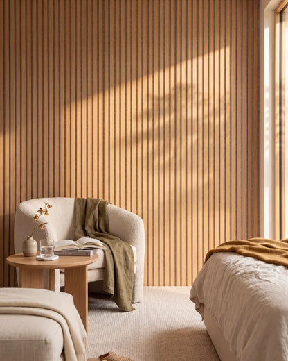 Acupanel Natural Oak (Grey Felt) acoustic slat wall panels in a reading nook