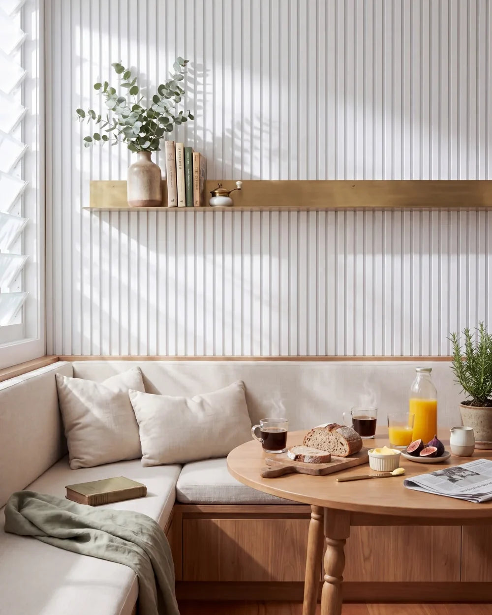 Acupanel White acoustic slat wall panels in a breakfast nook