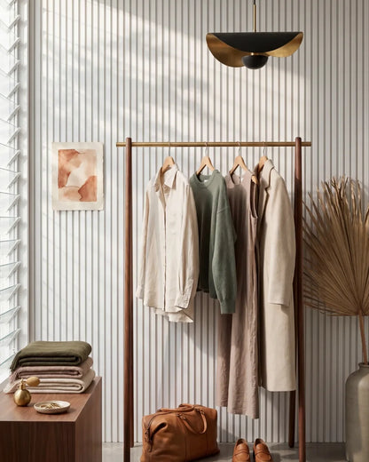 Acupanel White acoustic slat wall panels in a high-end retail store, a commercial space