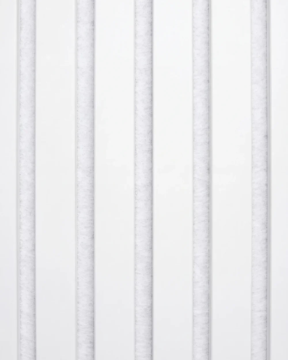 Acupanel White acoustic slat wall panel close up, showing the slat detail