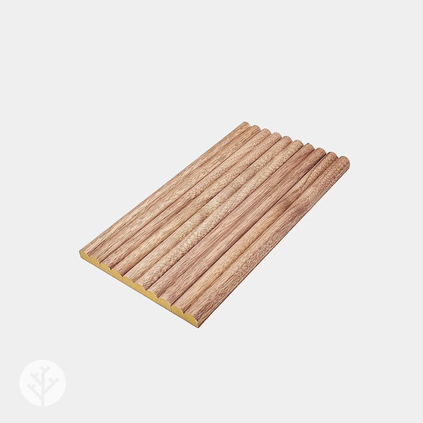 Comparison of oak and walnut Flutto samples side by side highlighting wood tone difference